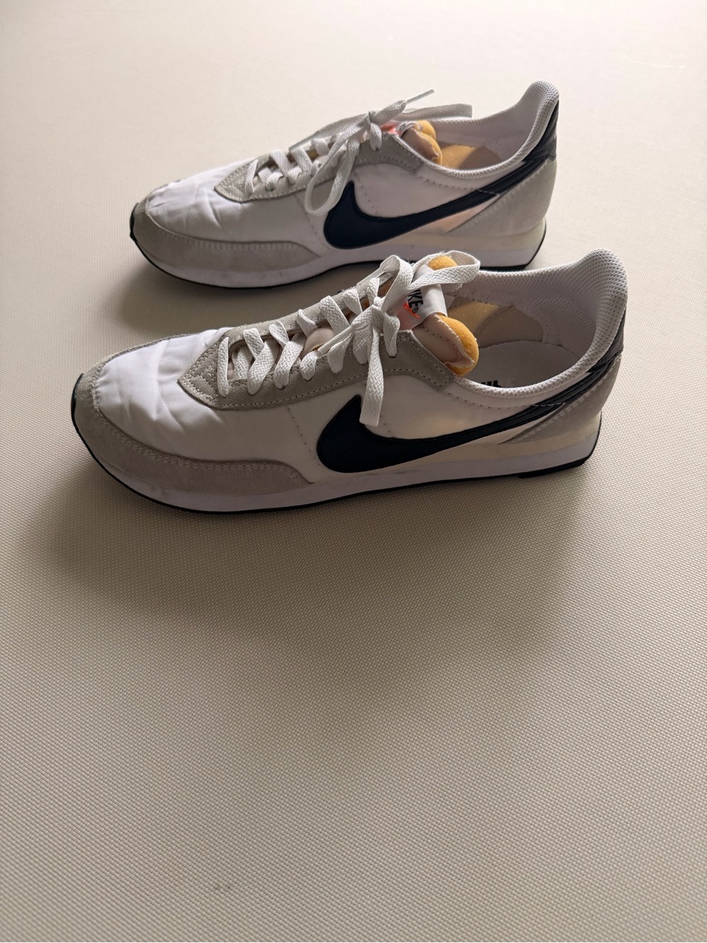 Nike White Sneakers with Black Swoosh and Gray Accents